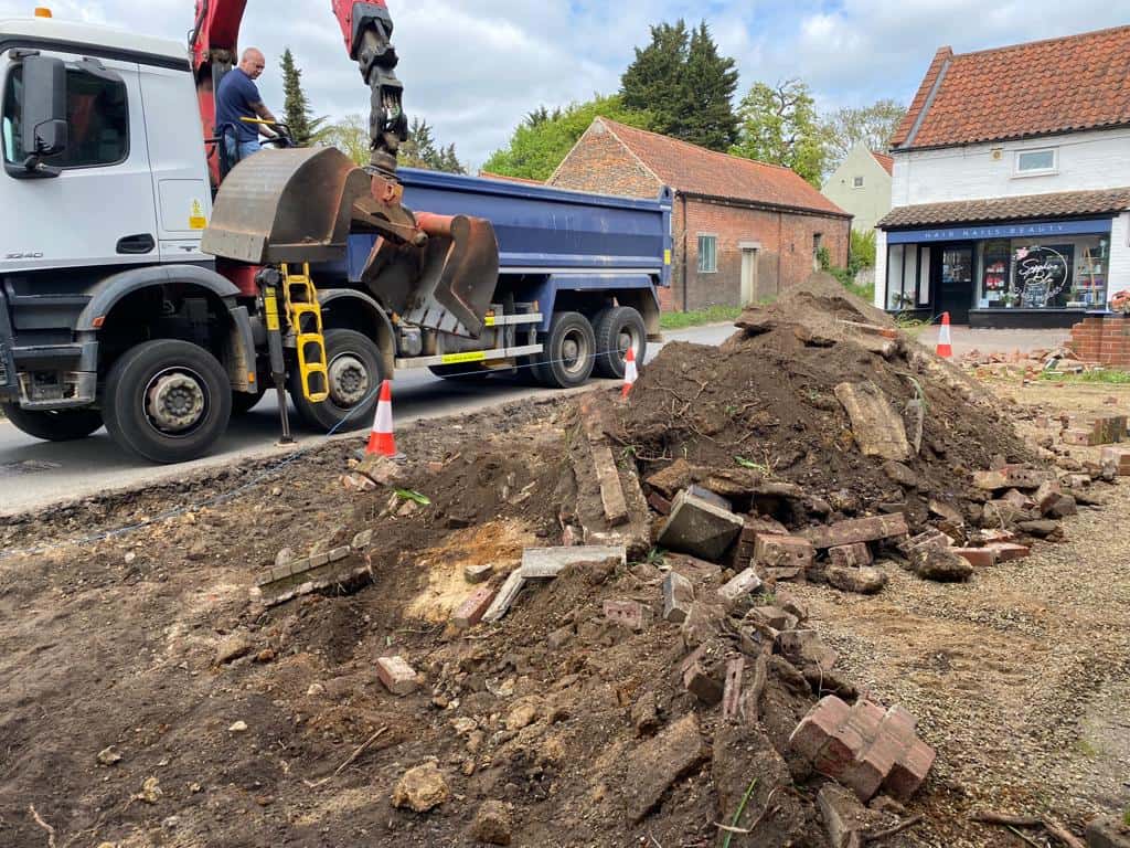 This is a photo of a dig out being carried out for the installation of a new tarmac driveway. Works being carried out by Downham Market Driveways